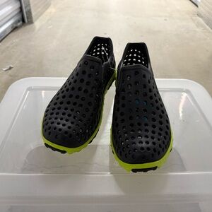 Black Perforated Slip-On Shoes with Neon Green Soles